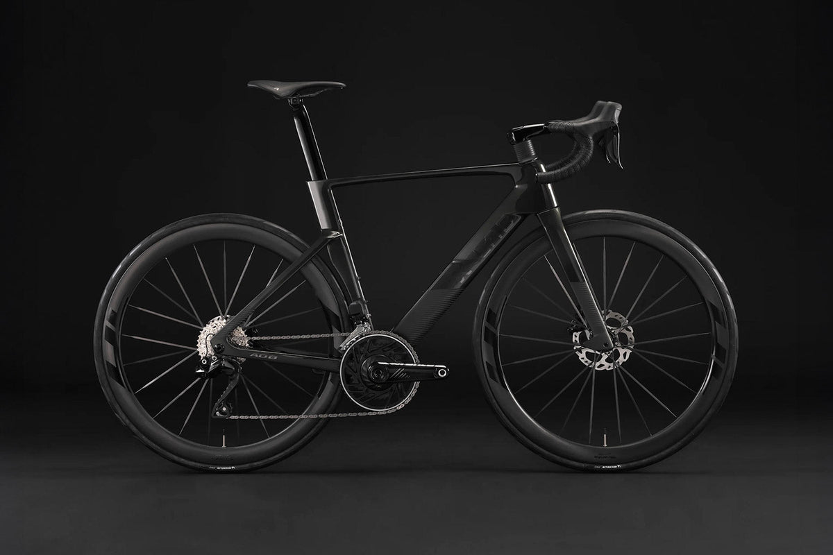 All black X-Lab AD8 in front of black back drop.