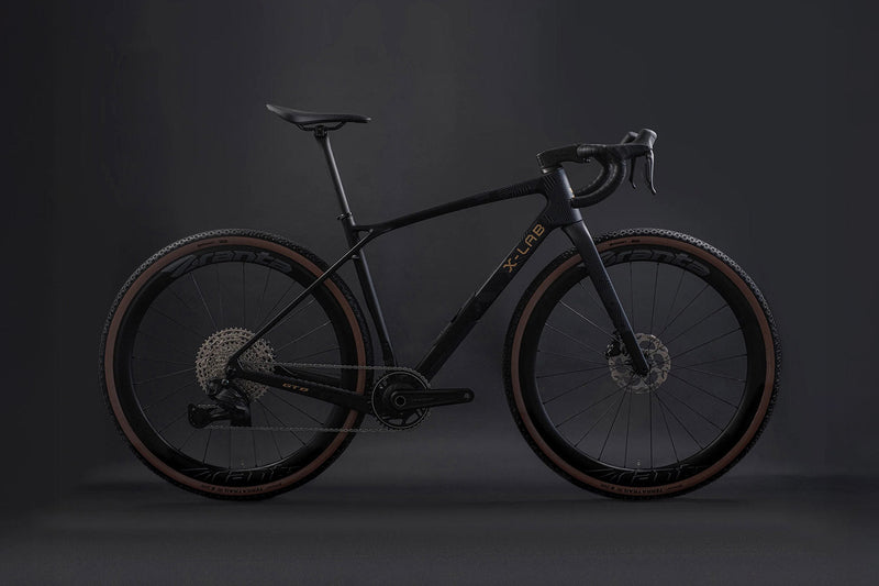Black bicycle on a dark background