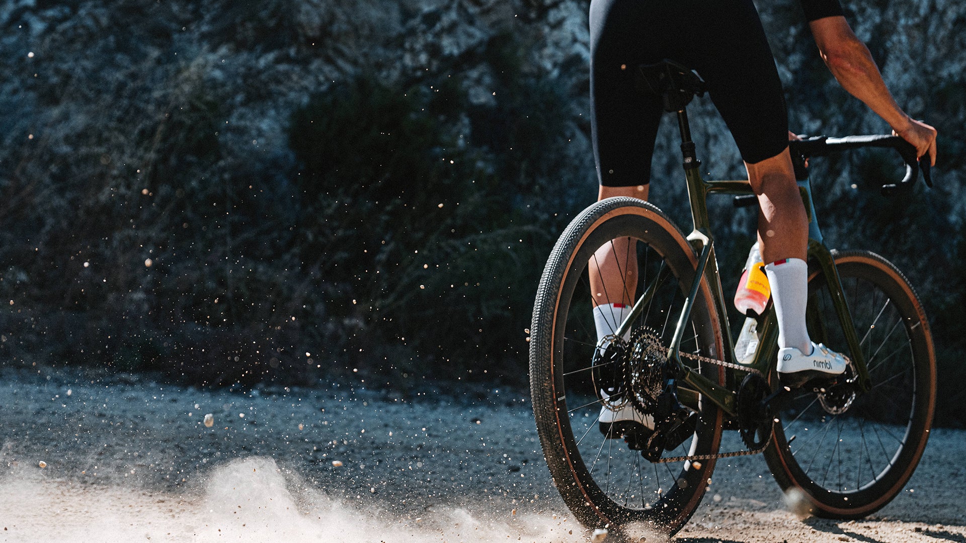 A person riding the cervelo rouvida gravel bike on a dirt road