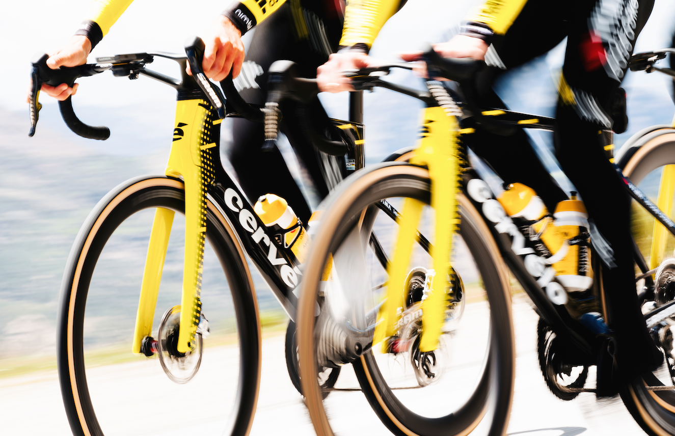 black and yellow cervelo S5s being ridden by a group of people