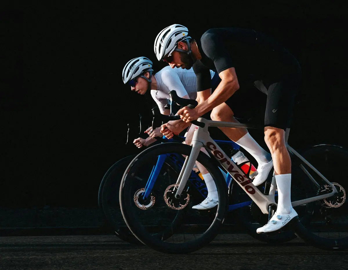Two men riding the cervelo soloist road bikes