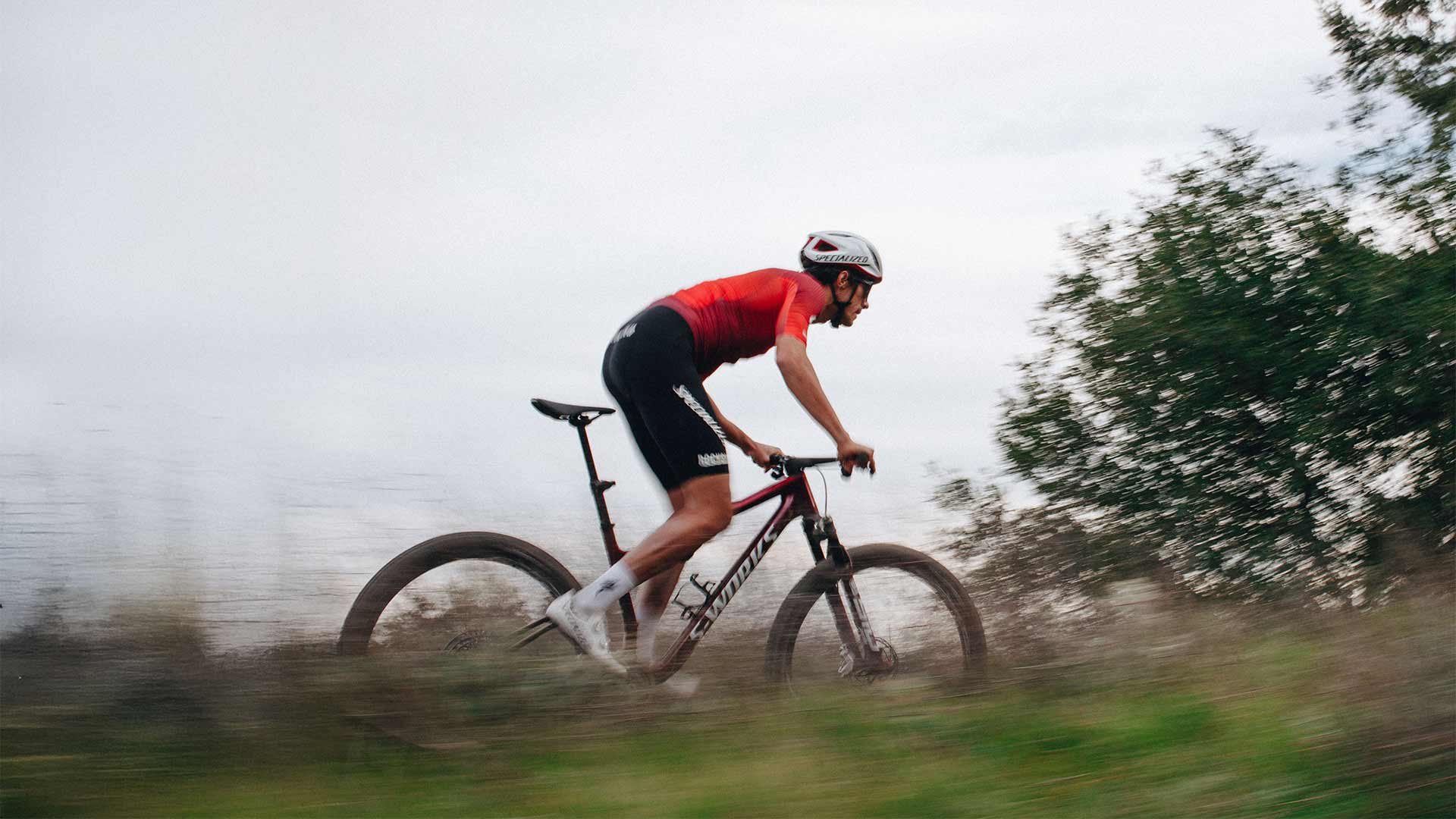 Cyclist riding a red Specialized Epic 9.