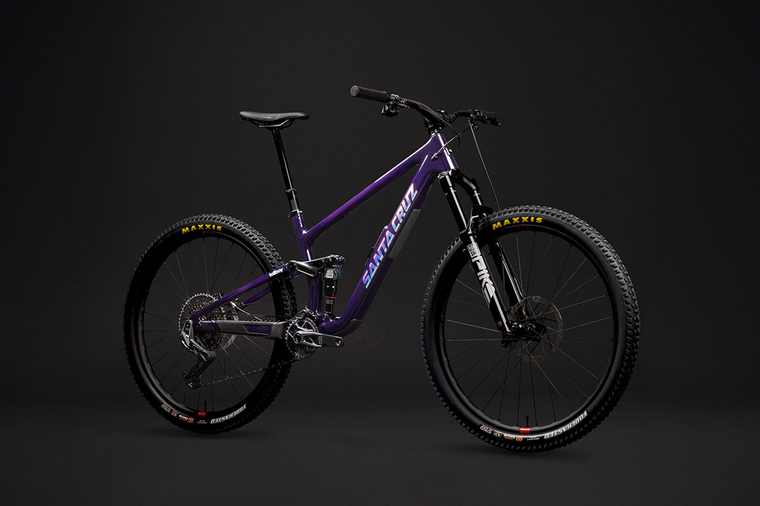 Purple mountain bike on a black background