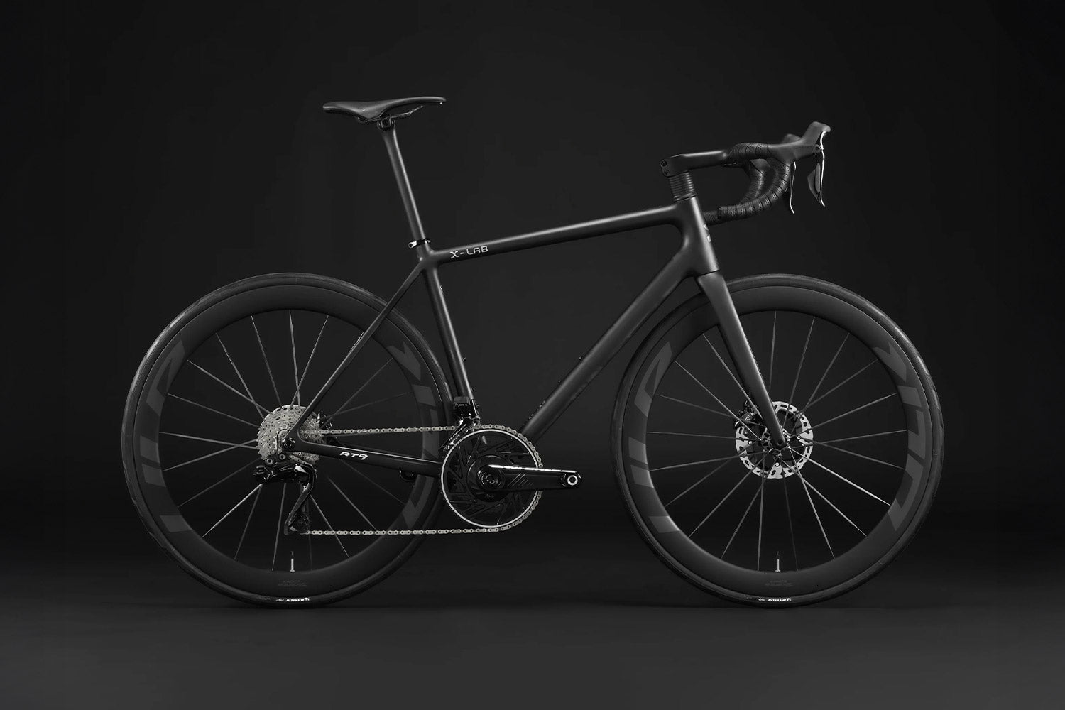 All black X-Lab RT9 in front of a grey background.