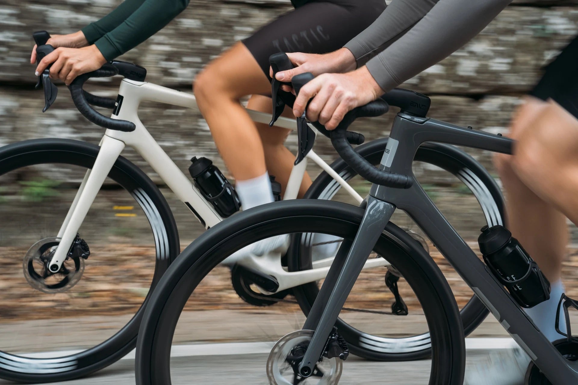 Two people riding the enve fray bicycle