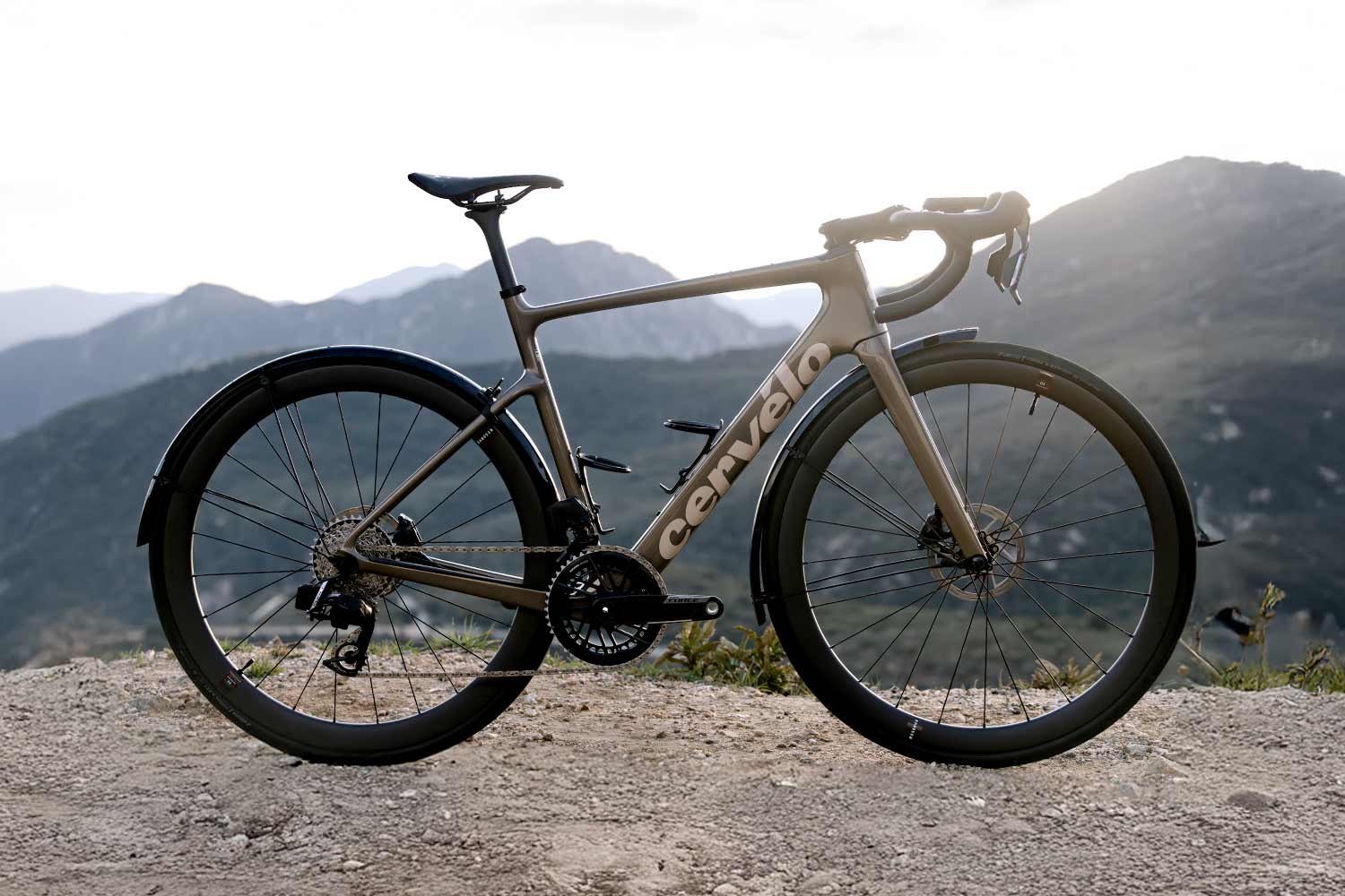 Bicycle with 'Cannondale' branding on a mountainous landscape