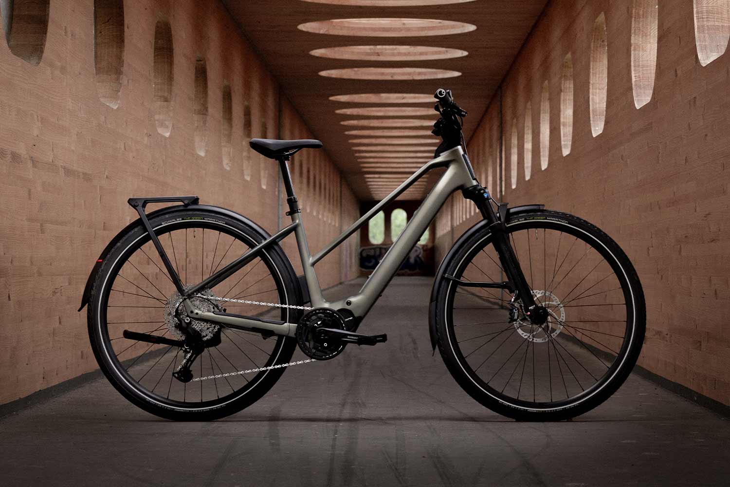 Electric bicycle in a tunnel with architectural design.