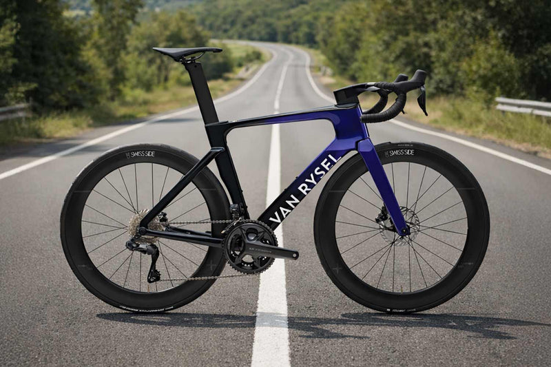Van Rysel bicycle on a road with trees in the background