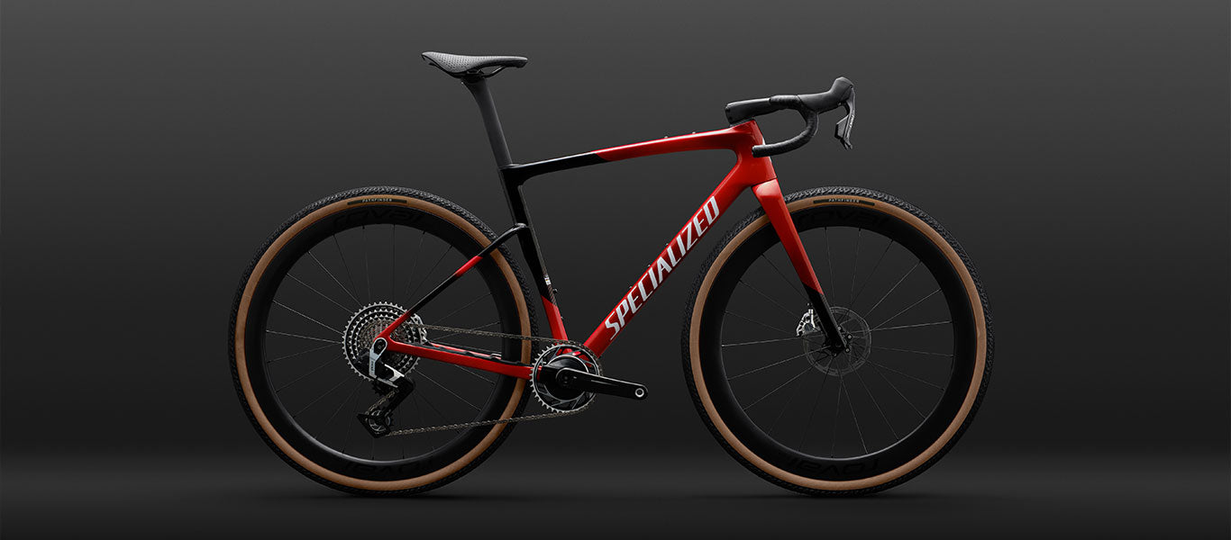 Specialized Crux 5 in red and black with tan sidewall tires.