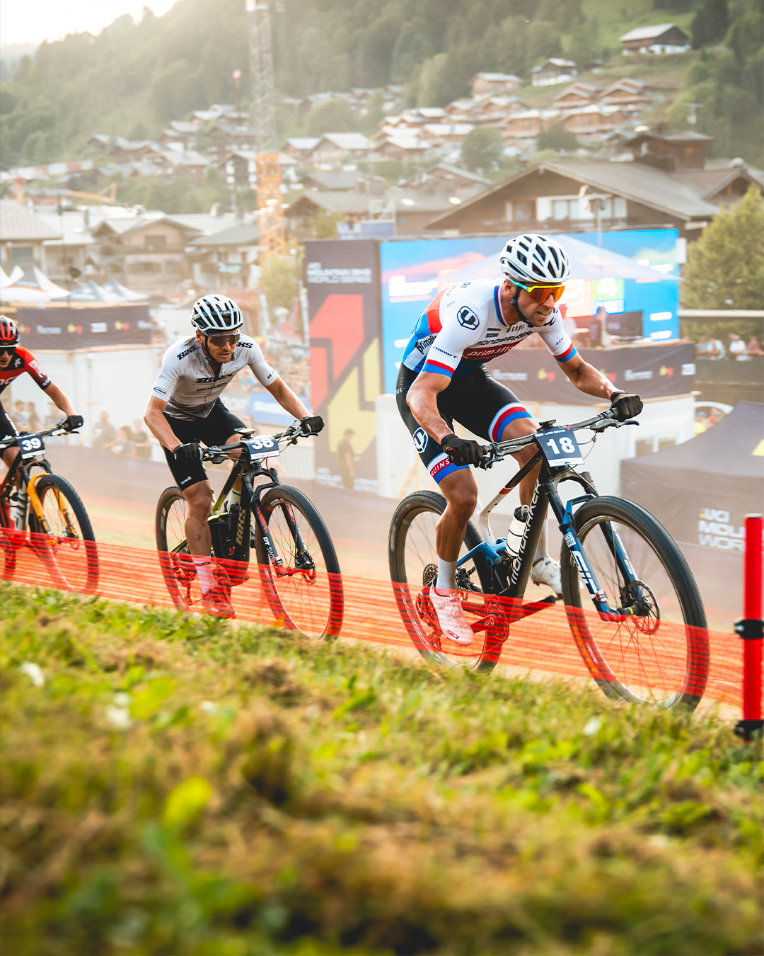 A group of people riding biikes on a cross country mountain bike trail, on the Mondraker crafty. Available at Contender Bicycles.