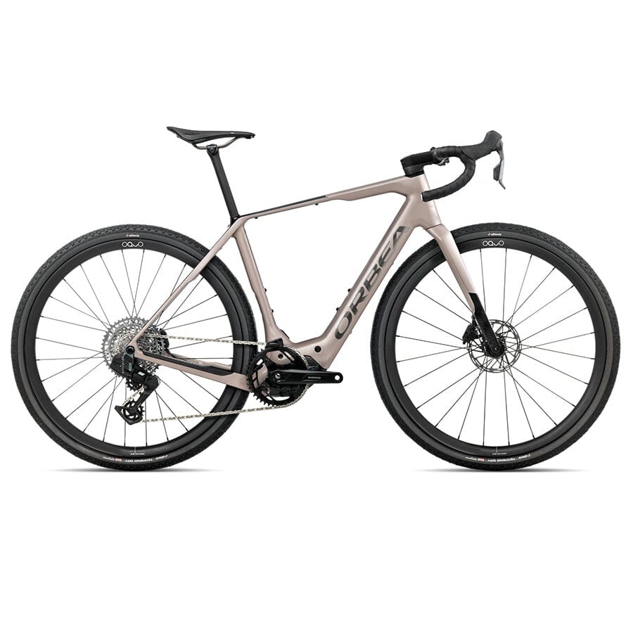 orbea electric gravel bike 2026 Denna M31e 28mph, Nickel Matt Racktime Lightit 2.0 Tour collection: Chopping Boards Color:Mist Green with an autonomy that