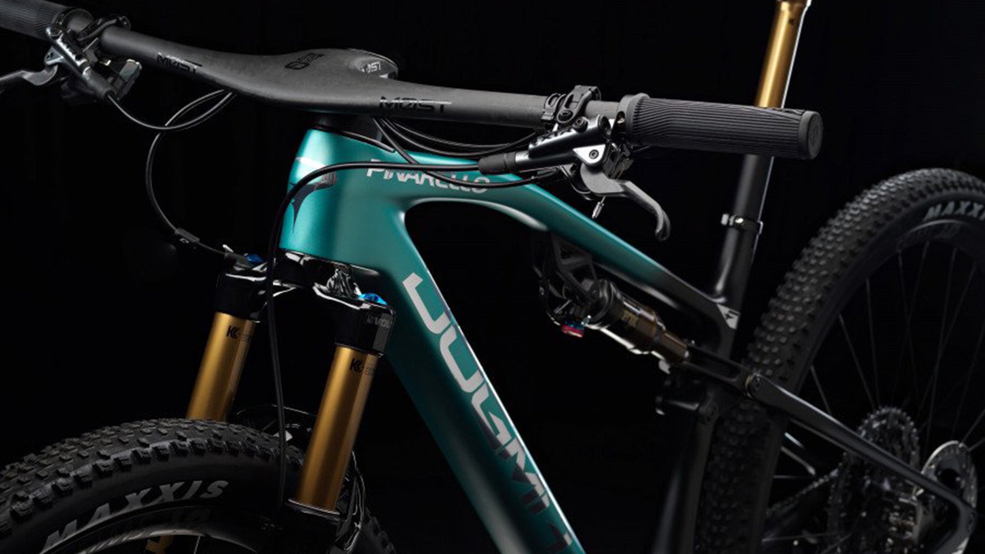 A pinarello Dogma XC mountain bike against a black background. 