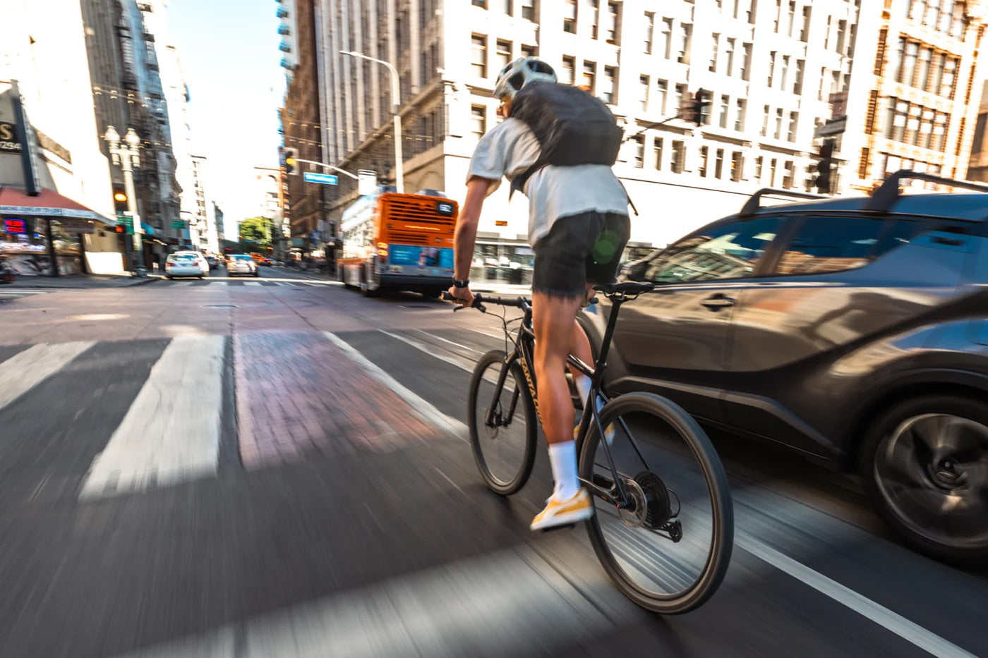 a man riding the Santa Cruz Skitch through a city