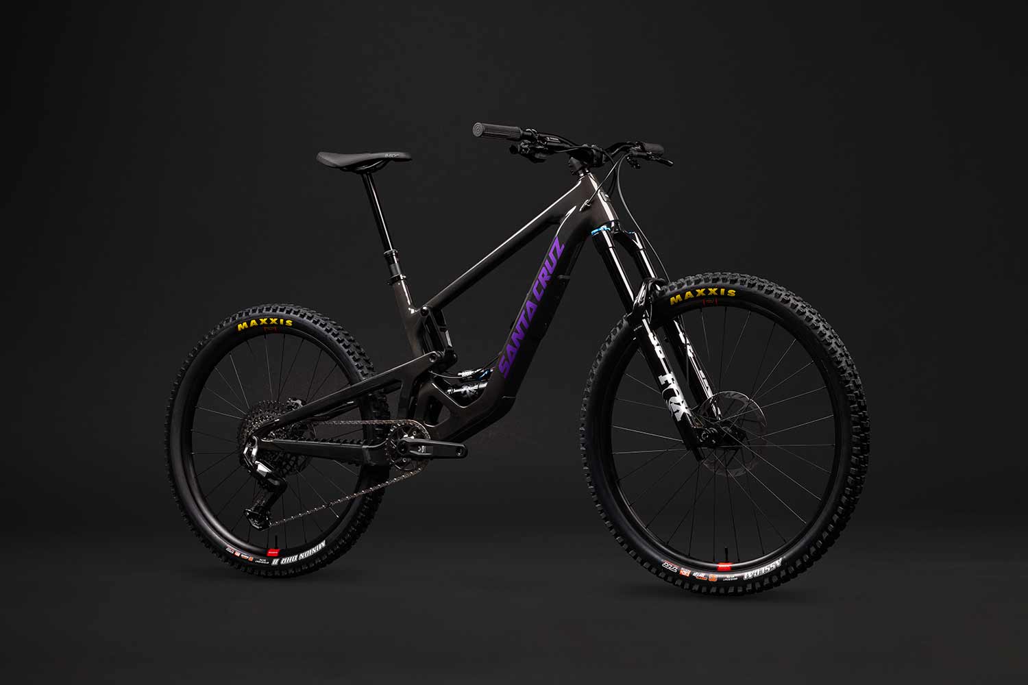 Grey and purple Santa Cruz Bronson in front of a grey background.