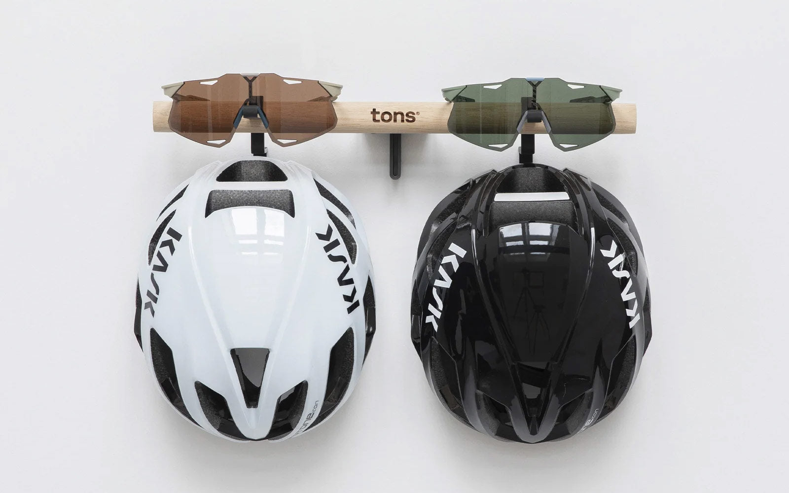 Tons gear organizer on the wall with Kask helmets.