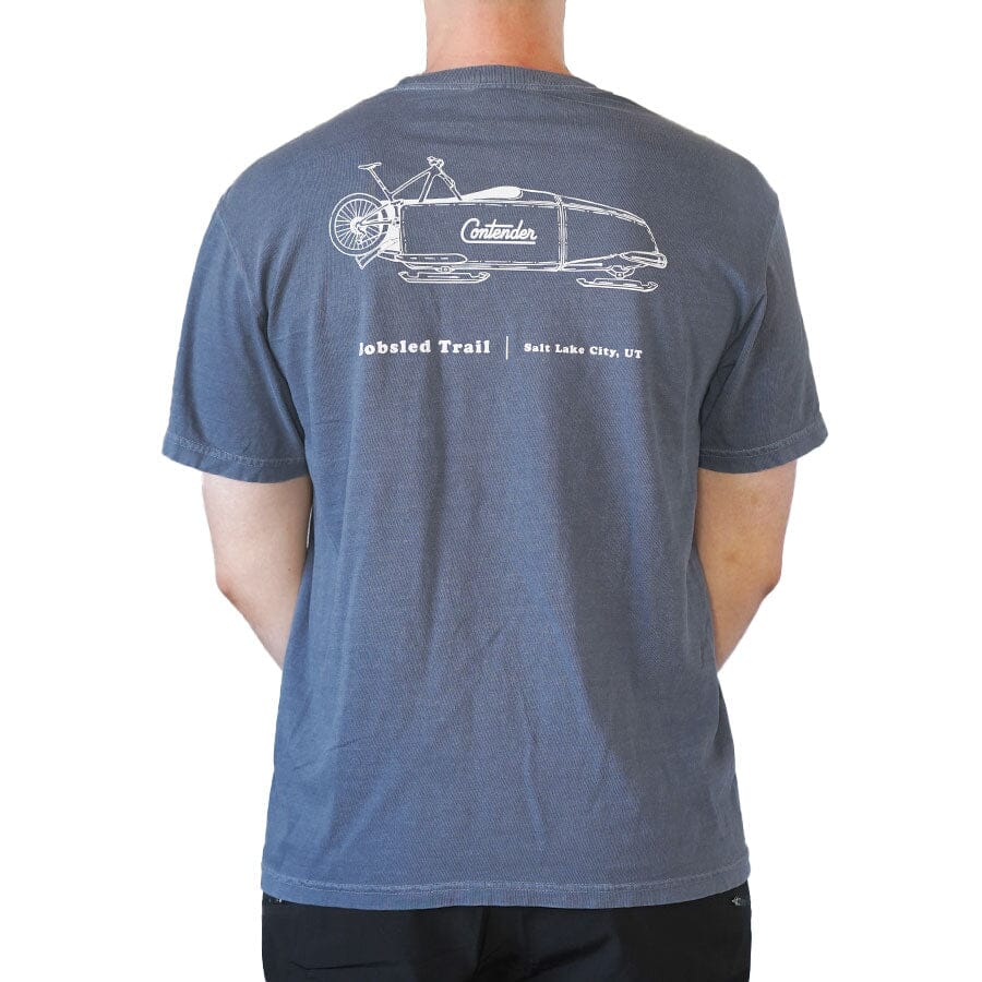 Back view of the blue Contender Trail Series Bobsled T-shirt featuring a bike bobsled graphic and Salt Lake City, Utah lettering.