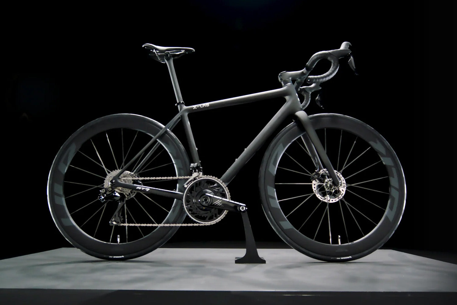 Black bicycle on a black background