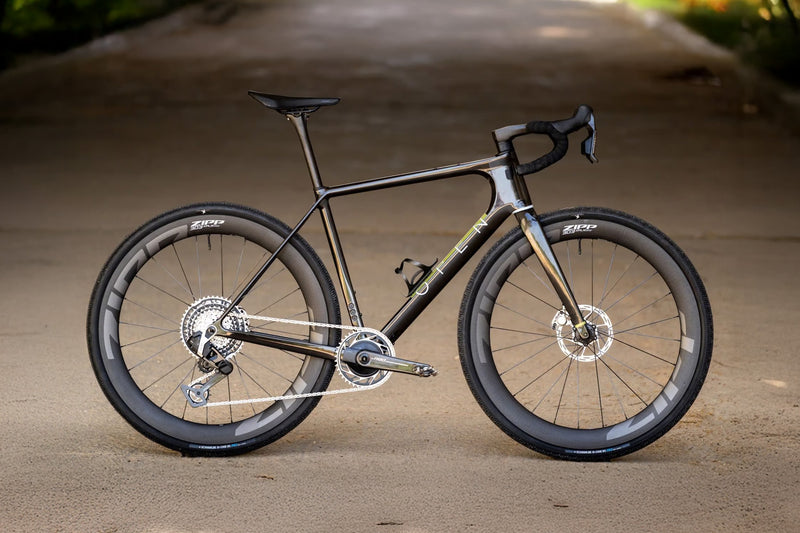 Carbon fiber bicycle on a blurred road background